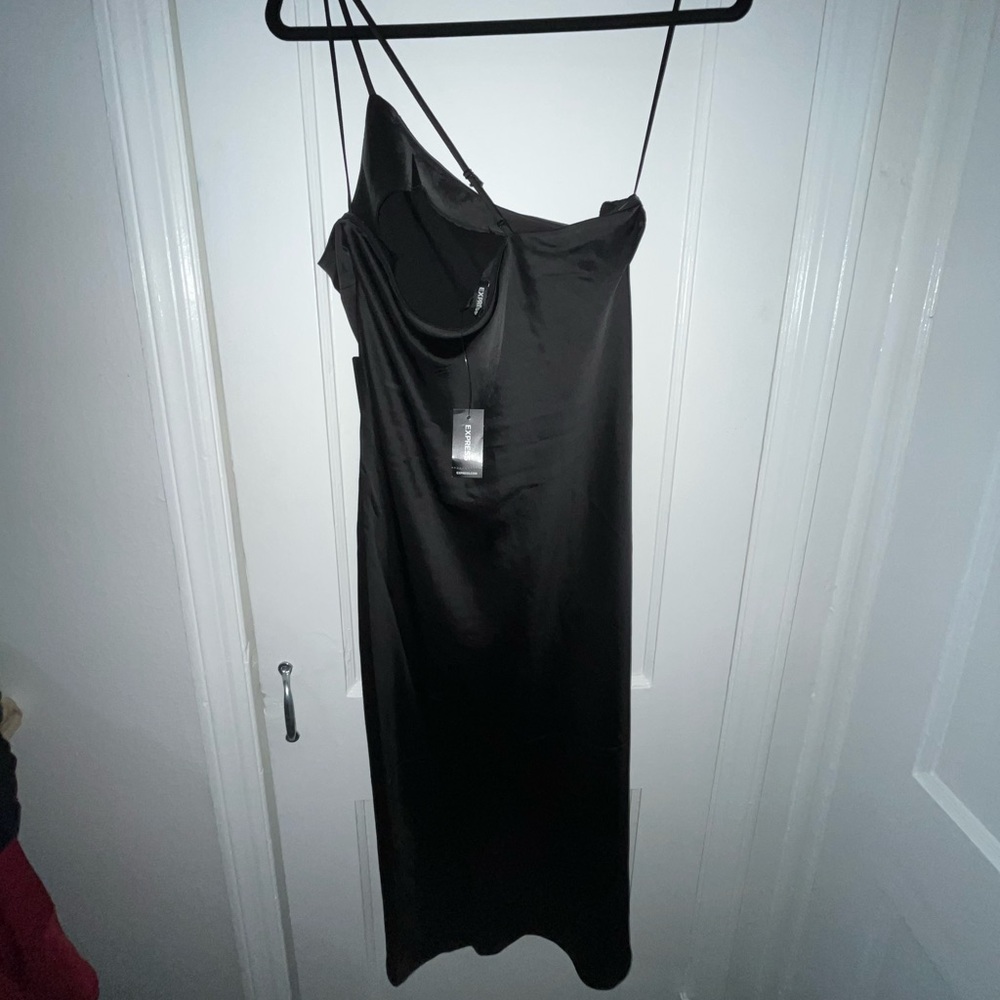 Black Express one shoulder slip dress.